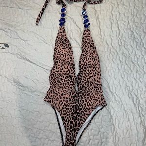 Animal print one-piece swimsuit with rhinestone .